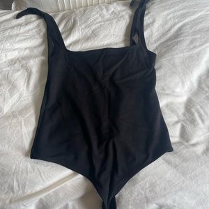 Adorable shoulder tie free people bodysuit